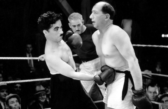 &Ncy;&iecy;&mcy;&ocy;&iecy; &kcy;&icy;&ncy;&ocy; &vcy; &Tcy;&rcy;&icy;&ucy;&mcy;&fcy;&iecy;&colon; &CHcy;&acy;&pcy;&lcy;&icy;&ncy;&period; &laquo;&Ocy;&gcy;&ncy;&icy; &bcy;&ocy;&lcy;&softcy;&shcy;&ocy;&gcy;&ocy; &gcy;&ocy;&rcy;&ocy;&dcy;&acy;&raquo; &lpar;1931&rpar;