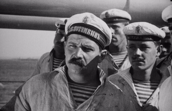 &Ncy;&iecy;&mcy;&ocy;&iecy; &kcy;&icy;&ncy;&ocy; &vcy; &Tcy;&rcy;&icy;&ucy;&mcy;&fcy;&iecy;&colon; &Ecy;&jcy;&zcy;&iecy;&ncy;&shcy;&tcy;&iecy;&jcy;&ncy;&period; &laquo;&Bcy;&rcy;&ocy;&ncy;&iecy;&ncy;&ocy;&scy;&iecy;&tscy; &laquo;&Pcy;&ocy;&tcy;&iecy;&mcy;&kcy;&icy;&ncy;&raquo; &lpar;1925&rpar;